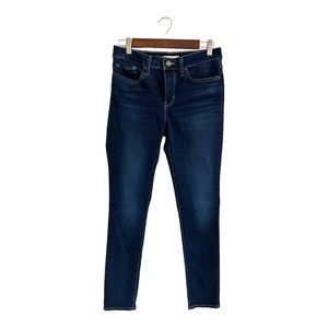 Levi’s dark blue denim 311 shaping skinny size 27  jeans.